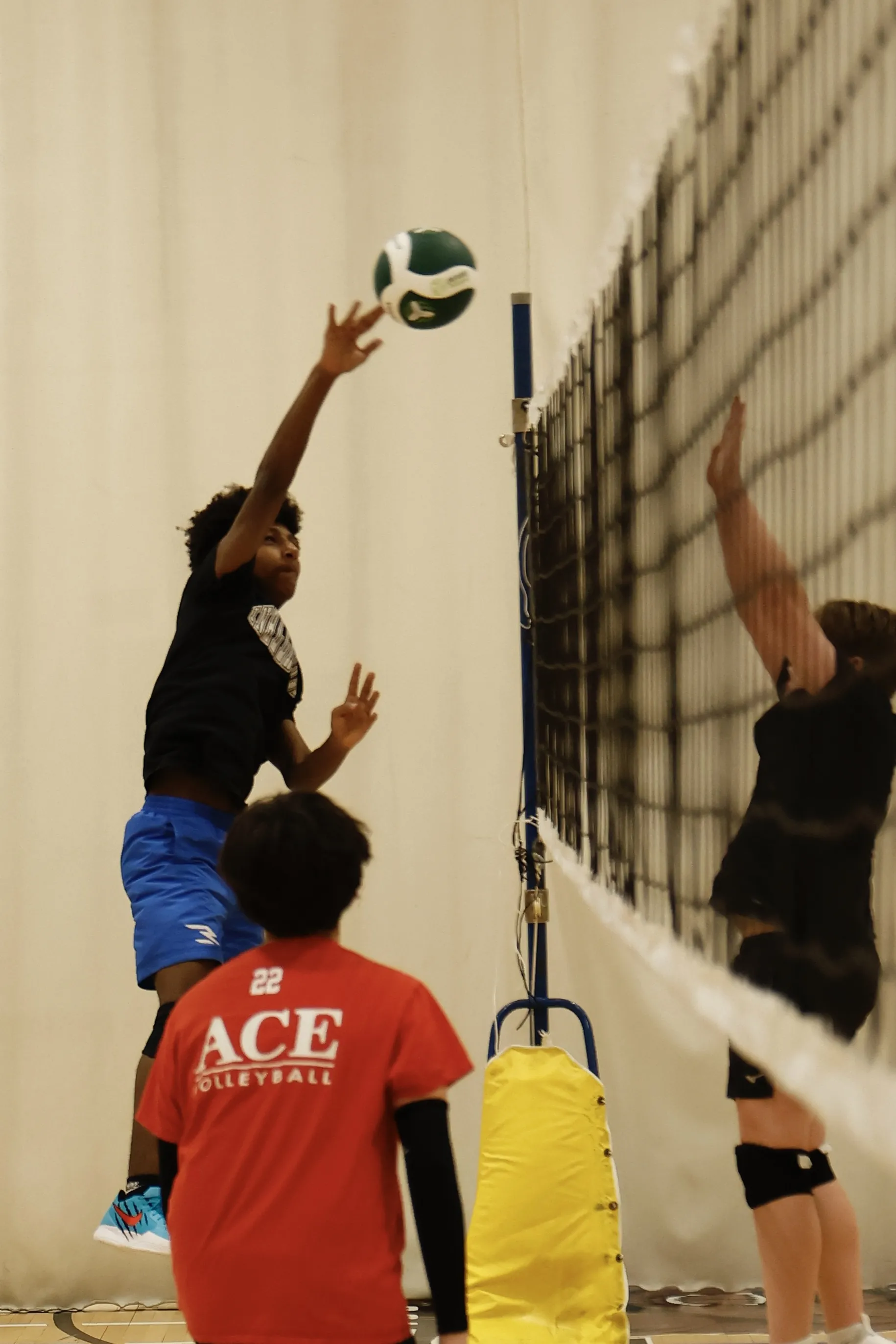 Athletes during volleyball practice drill