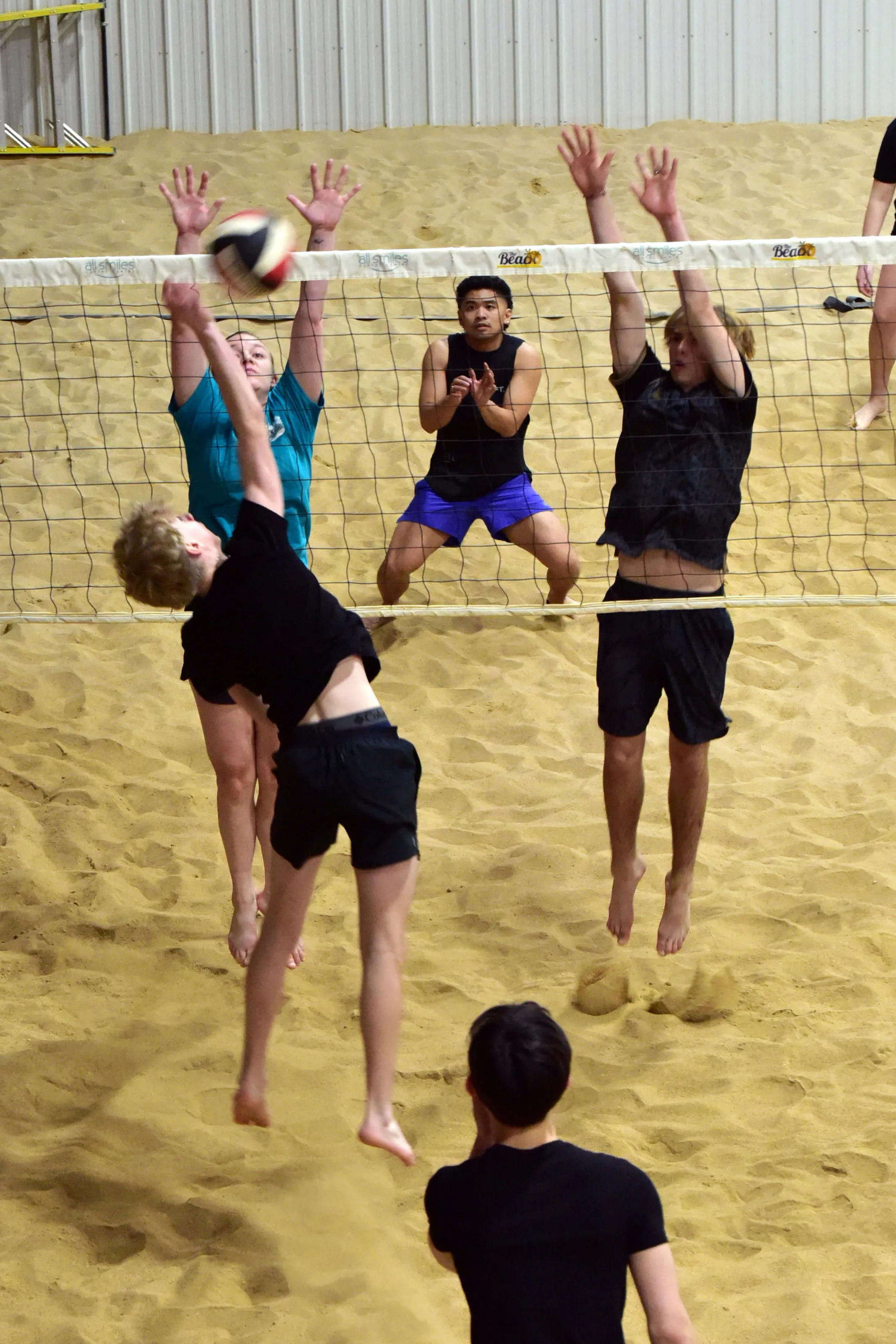Boys volleyball player passing during a training session