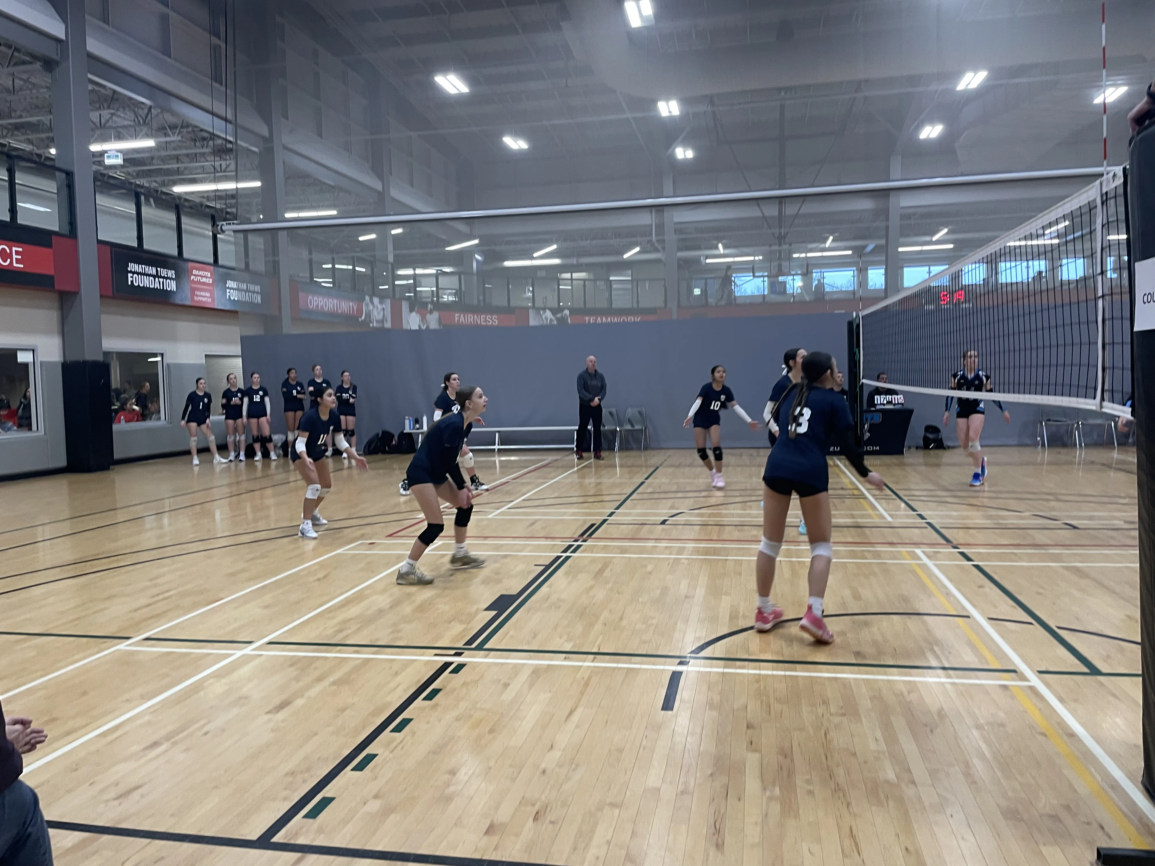 Team warm-up at Sky High Volleyball