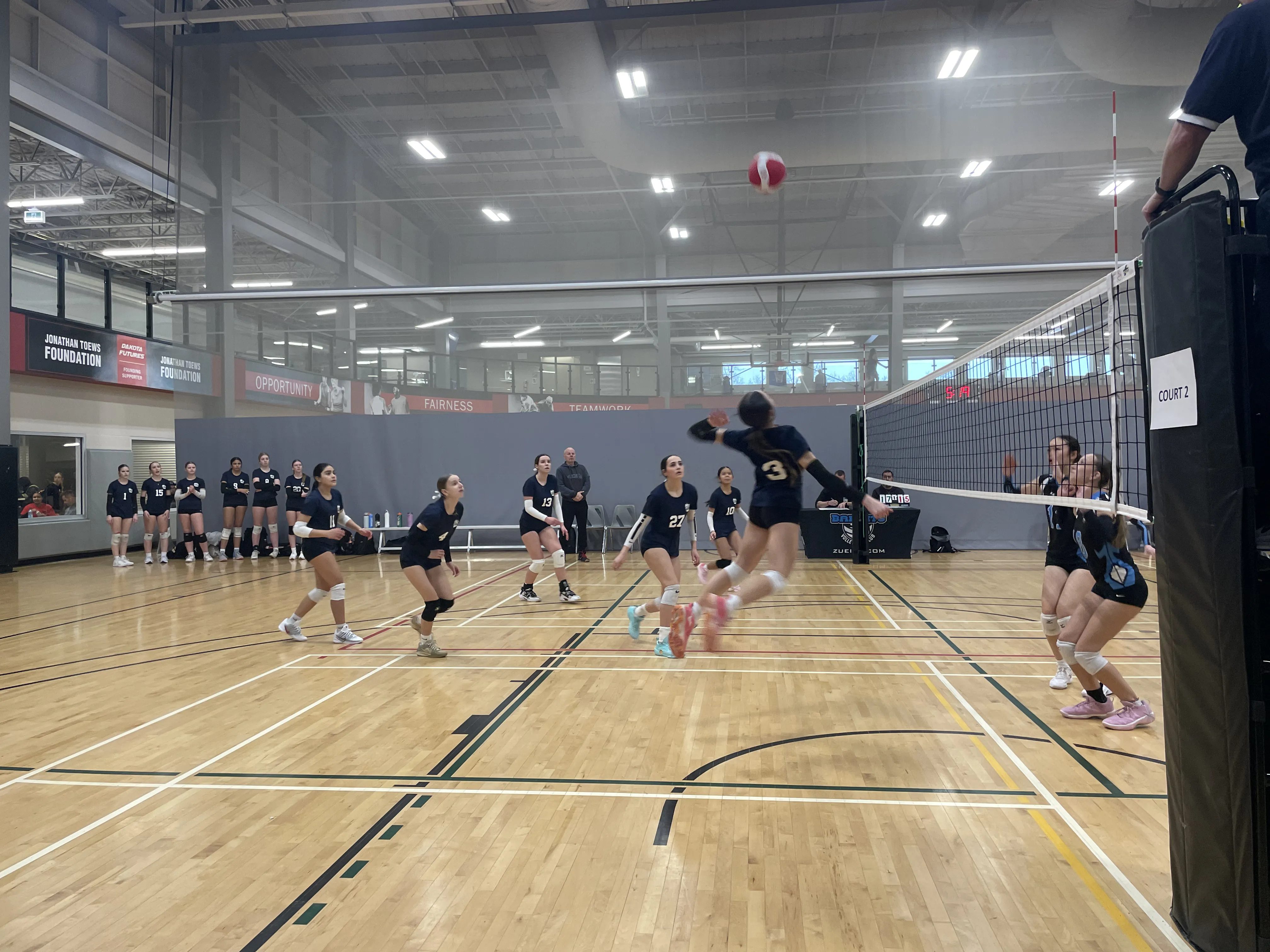 Youth volleyball athletes training at a Sky Volleyball session