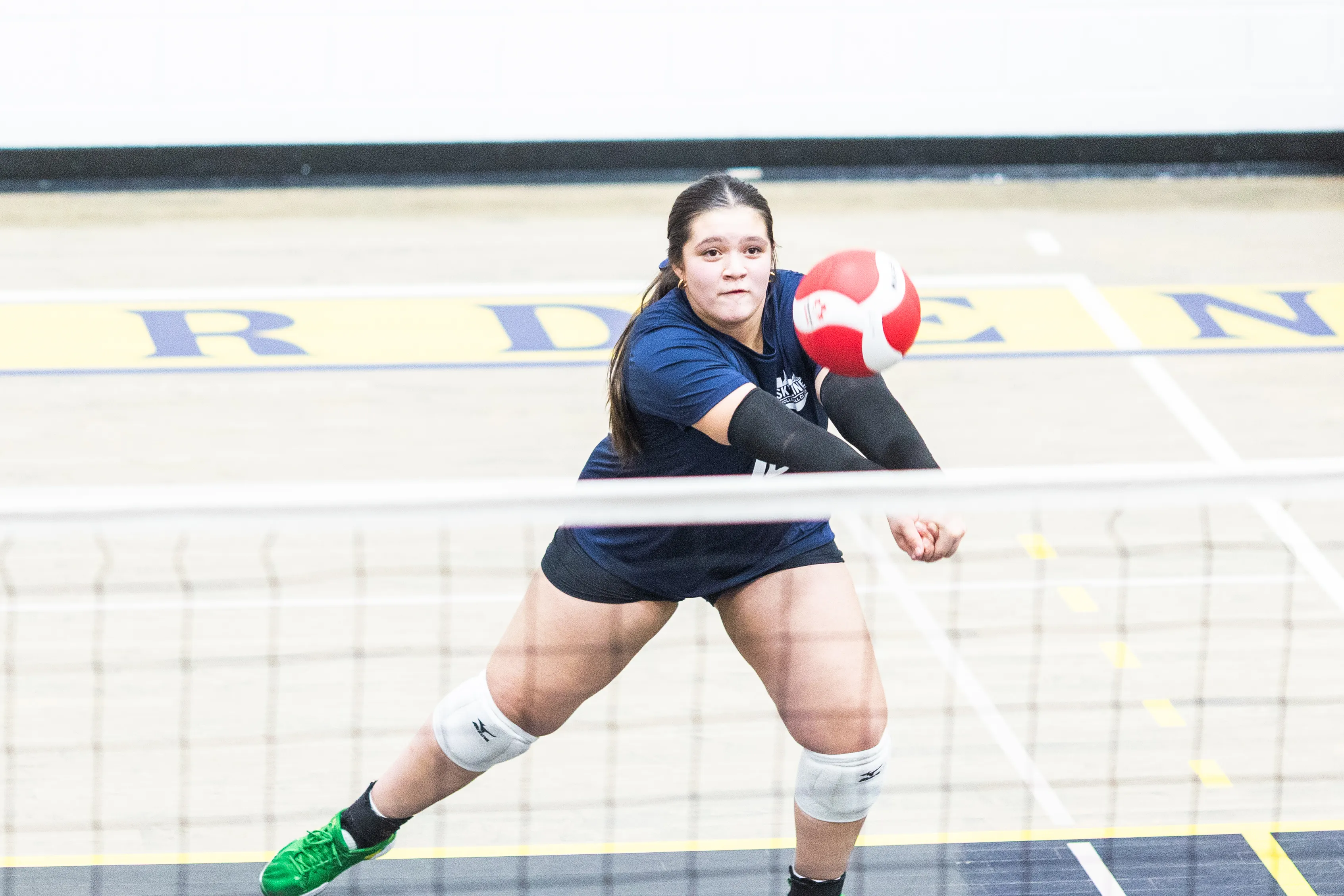 Skyline athletes competing at a volleyball tournament